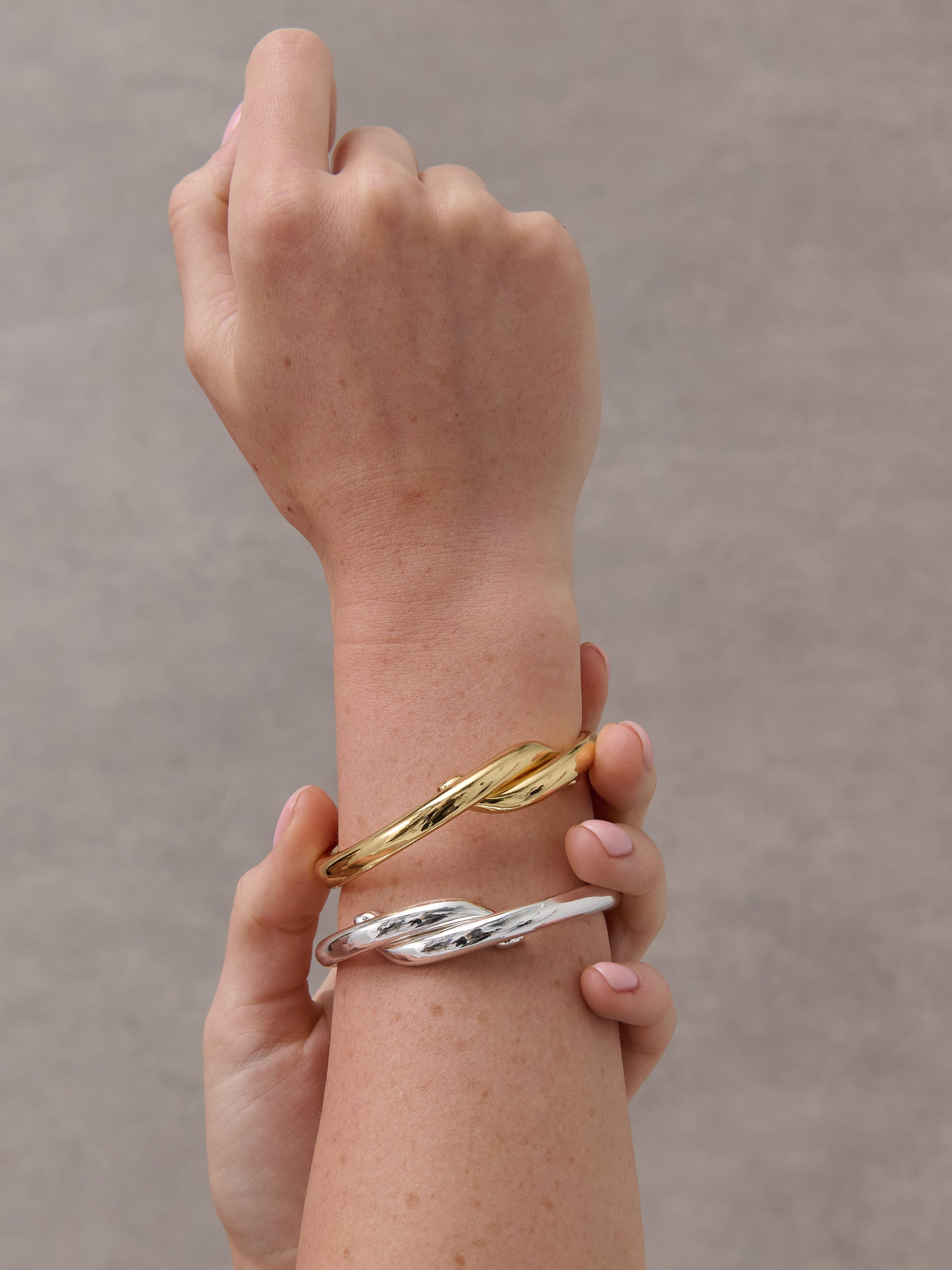 Interlock Twist Sterling Silver Plated Bangle