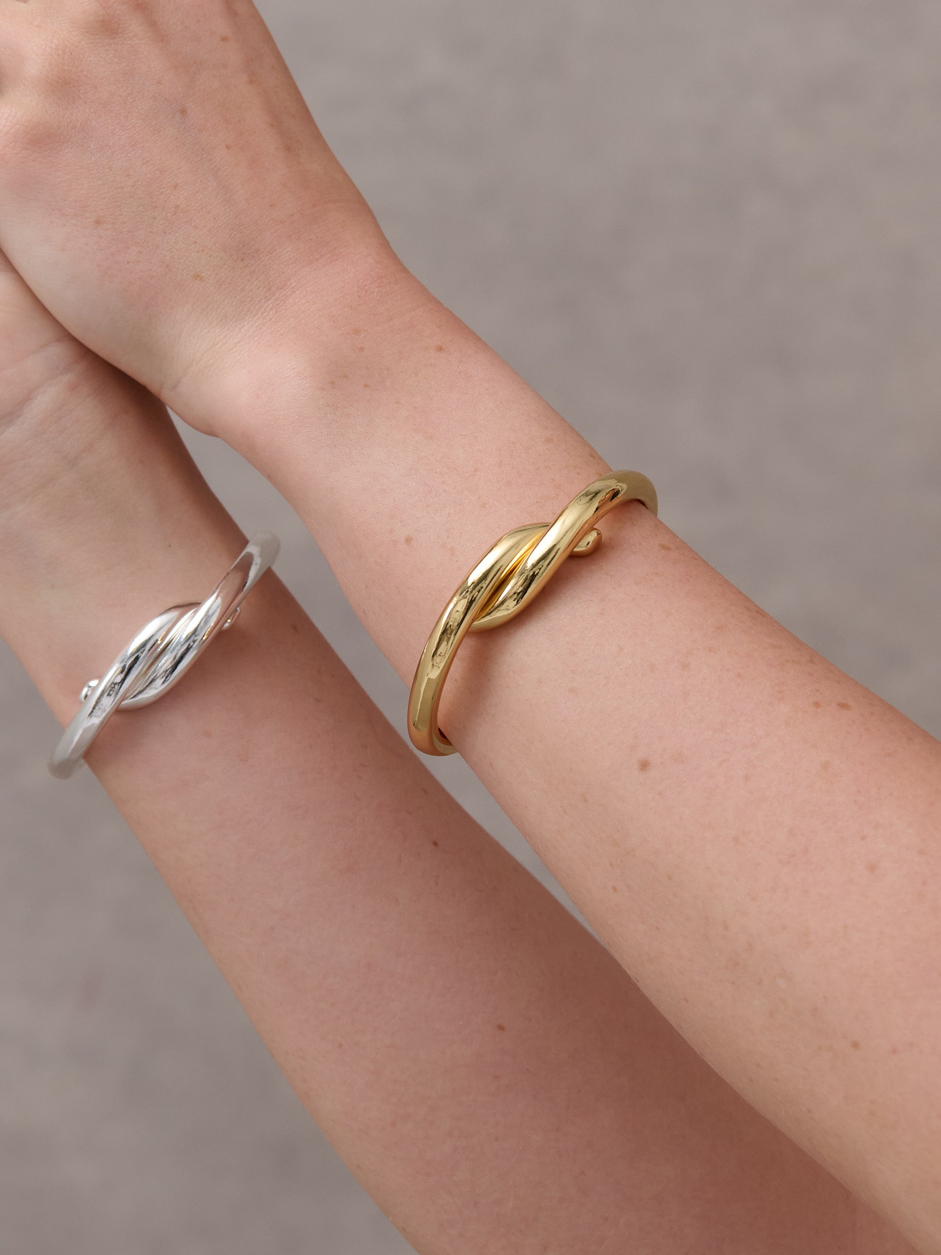 Interlock Twist Sterling Silver Plated Bangle