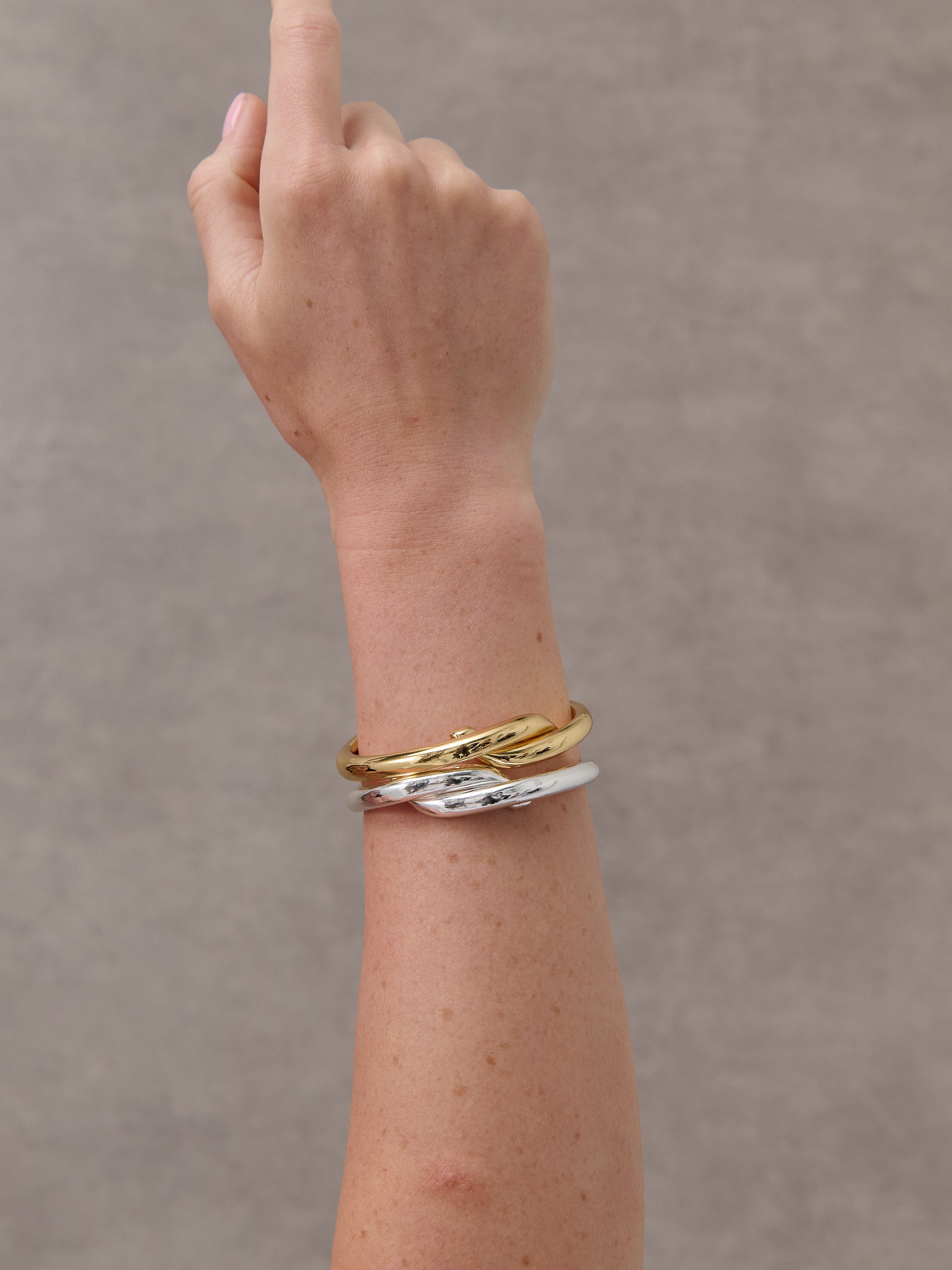 Interlock Twist Sterling Silver Plated Bangle
