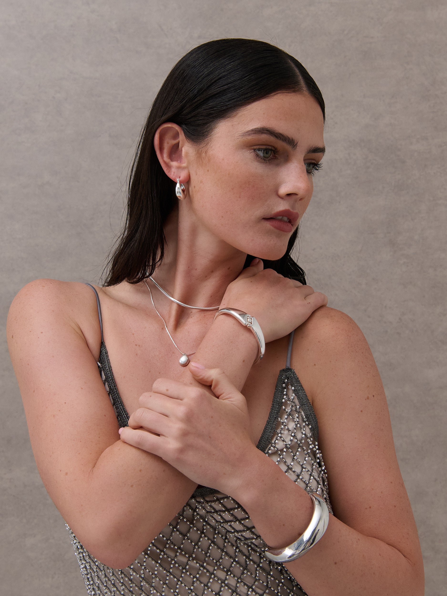 Interlock Twist Sterling Silver Plated Bangle