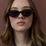Aire Oval Frame Sunglasses in Tort