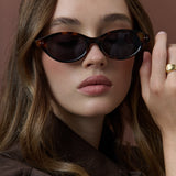 Aire Oval Frame Sunglasses in Tort