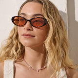 Anderson Oval Frame Sunglasses in Tort