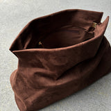 Becca Suede Clutch Bag in Brown