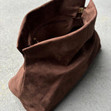 Becca Suede Clutch Bag in Brown