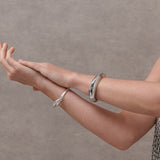 Interlock Twist Sterling Silver Plated Bangle