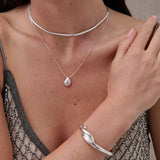 Interlock Twist Sterling Silver Plated Bangle