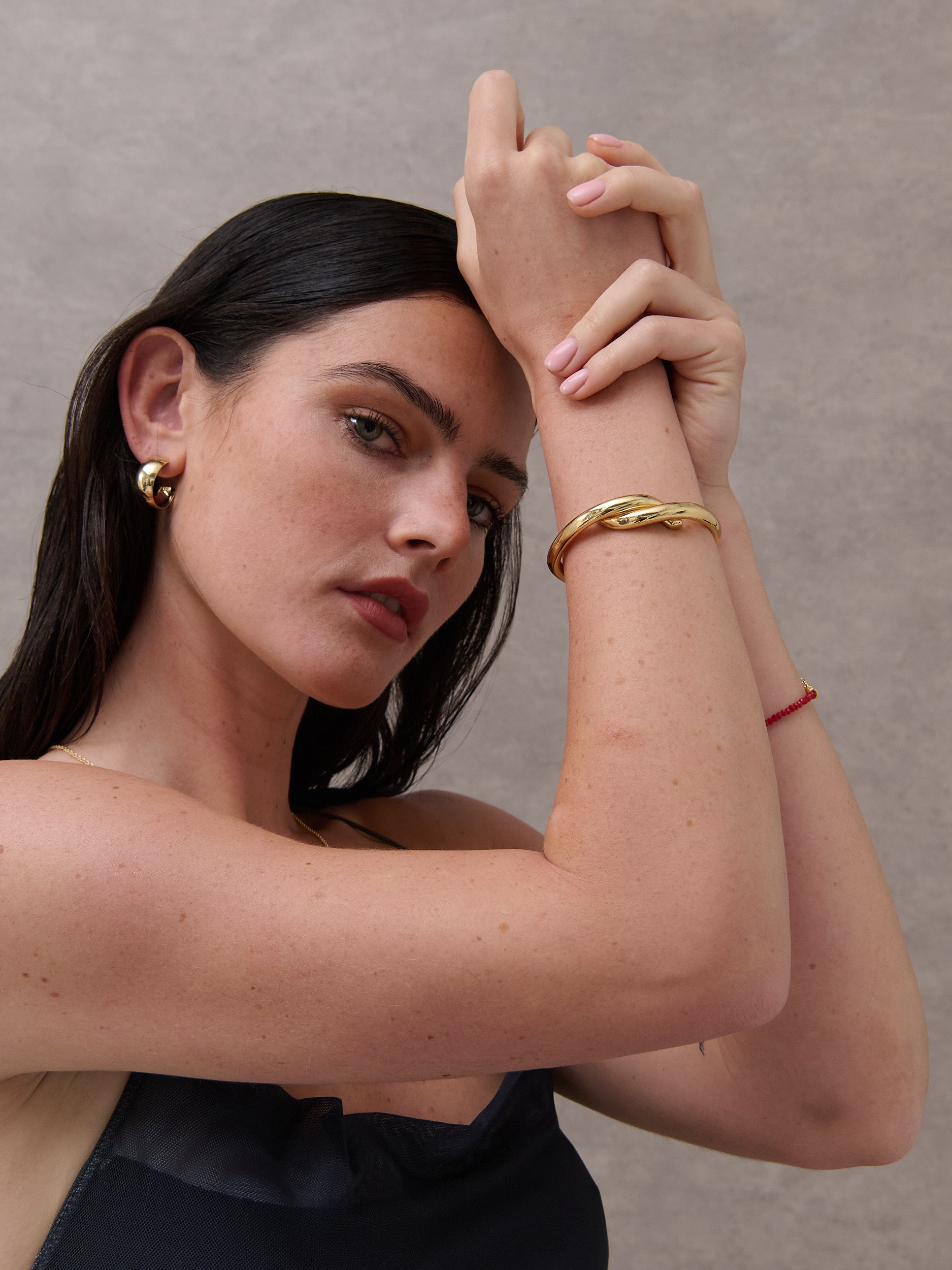 Interlock Twist 18K Gold Plated Bangle