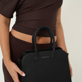Clemence Pebbled Handbag in Black