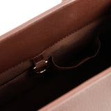 Clemence Pebbled Handbag in Brown