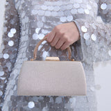 Nuvia Duo Top Handle Clutch Bag in Gold